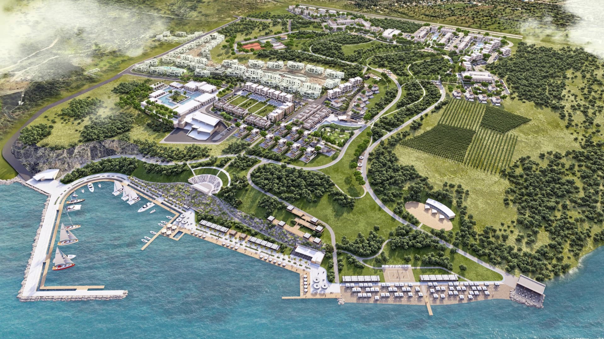 Sweeping aerial view of the entire La Casalia project, showcasing the marina, coastline, and lush landscape.